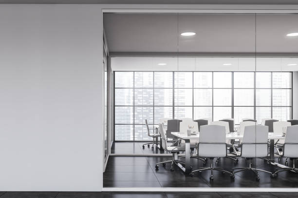 istock White and gray office meeting room with mock up wall 1287313192