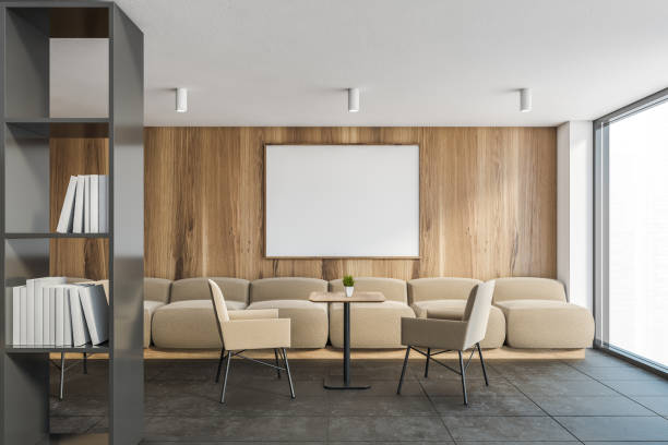 istock White and wooden office waiting room with poster 1287314094