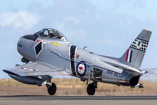 Avalon, Australia - February 25, 2013: Former Royal Australian Air Force (RAAF) Commonwealth Aircraft Corporation CA-27 Sabre (North American F-86 Sabre) fighter aircraft landing at Avalon Airport.