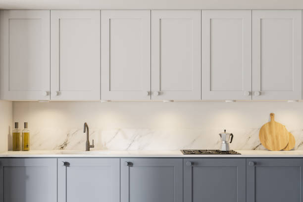 istock Modern white and gray kitchen interior with cabinets, close up 1287314158