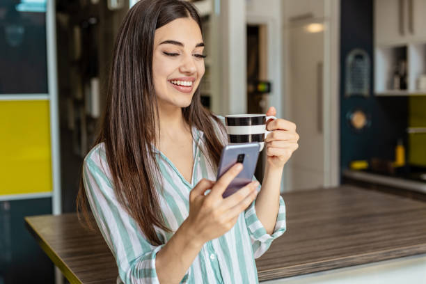 istock Morning coffee and using mobile phone 1287315050