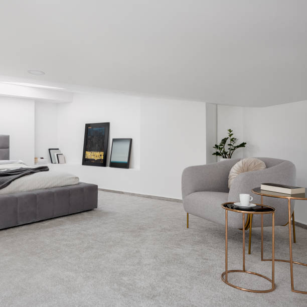 istock Attic room with carpet flooring 1287316642