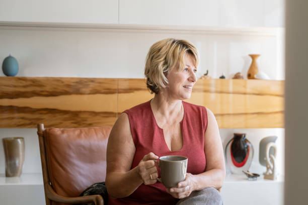 istock Beautiful mature woman drinking coffee 1287316894