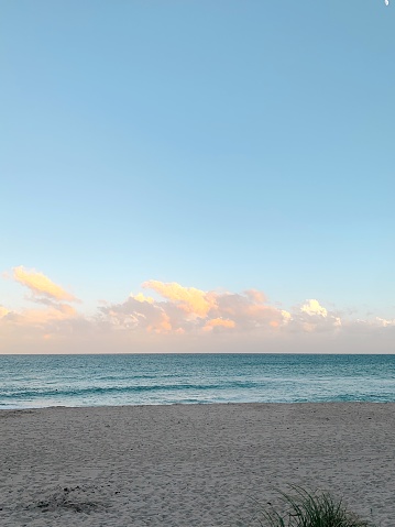 Cloudy Pink Sunset on Palm Beach, Florida.