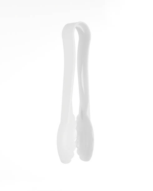 istock White Plastic Salad Tongs isolated on white 1287327545