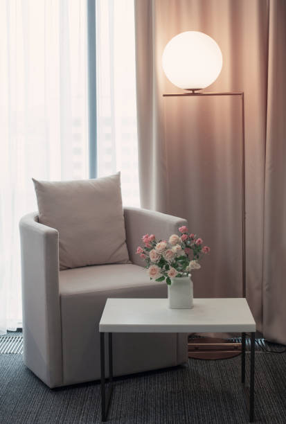 istock modern interior  with armchair and lamp 1287327546