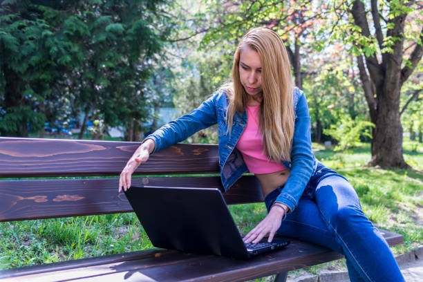 istock A young woman in the park 1287327944