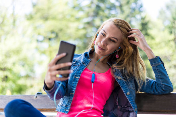 istock A young woman in the park 1287327945
