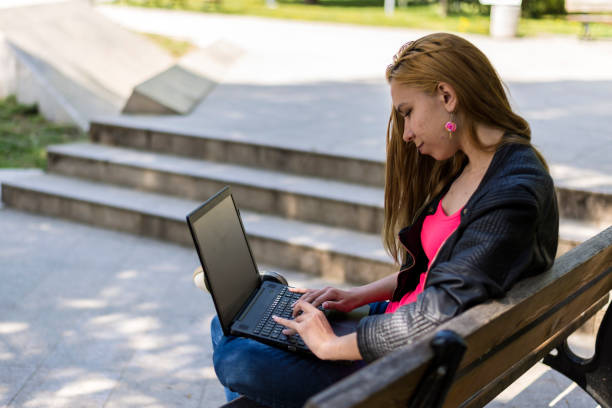 istock A young woman in the park 1287327949