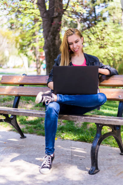 istock A young woman in the park 1287327955