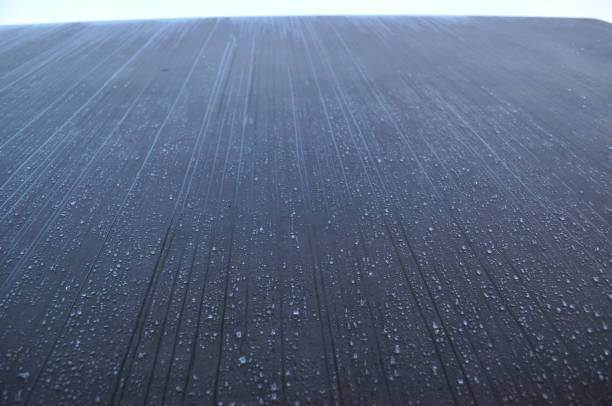 istock concrete wet wall facade texture gray facade close-up 1287329614