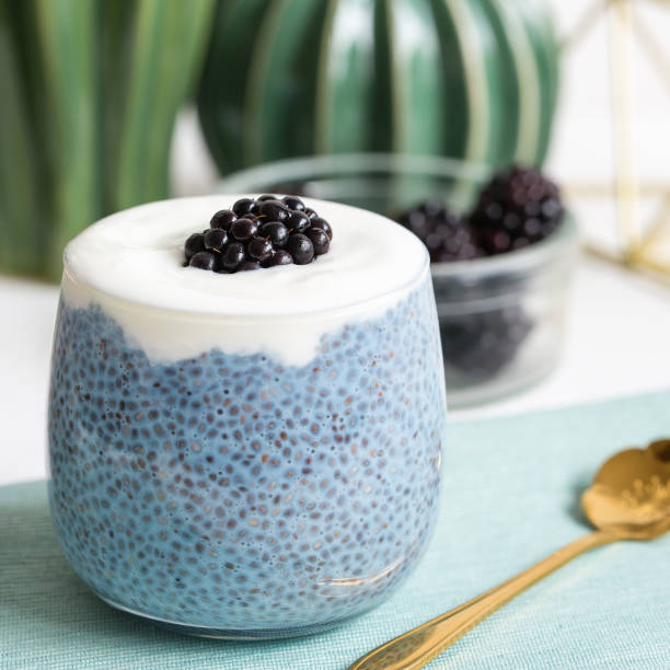 istock Blue chia seed pudding with blackberries in a glass 1287332102
