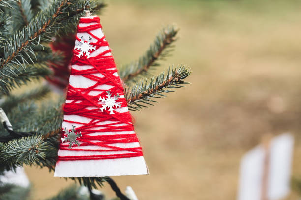 istock DIY yarn decoration on a Christmas tree 1287332126