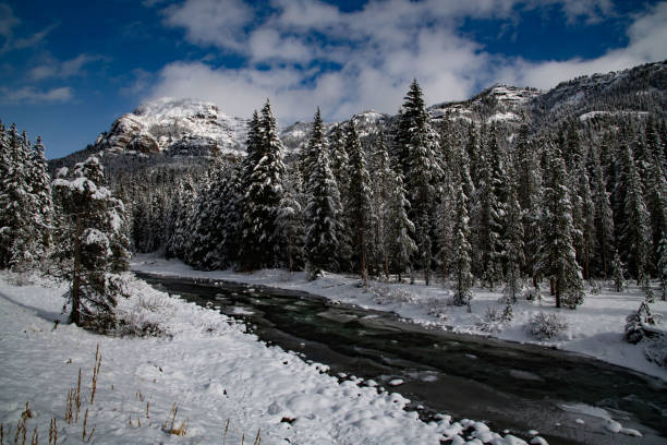 istock Winter landscape scene with mountains and snow 1287333074