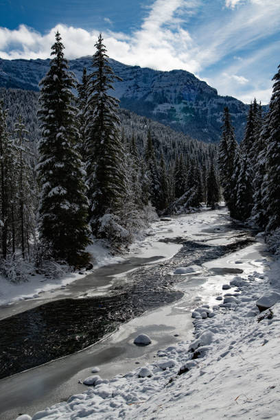 istock Winter landscape scene with mountains and snow 1287333843