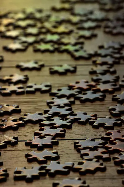A single puzzle piece in foreground.