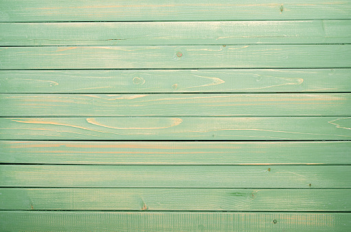 Green wooden Board background. Design concept. Copy of the space.