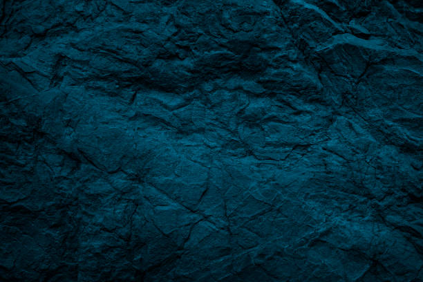 istock Blue green grunge background. Toned rock texture background. Dark stone background. 1287342518