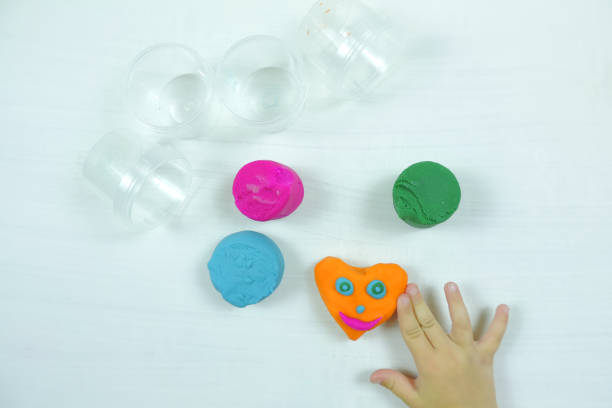 istock colored mass for modeling, decorative dough for children's creativity, baby made a heart 1287342625