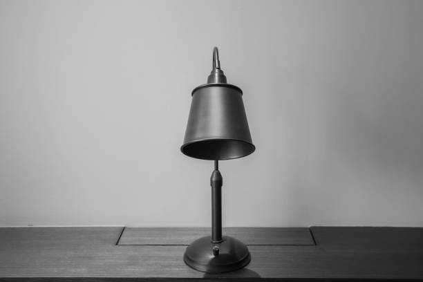 istock selective focus black and white vintage desk light lamp bulb for lighting in bedroom 1287343470