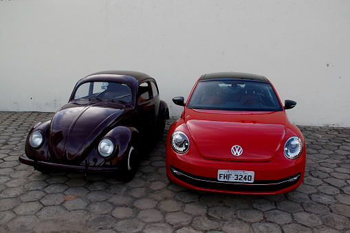 Udine, Italy. March 24, 2024 Vintage Beetles, in a row  during a classic car parade.
