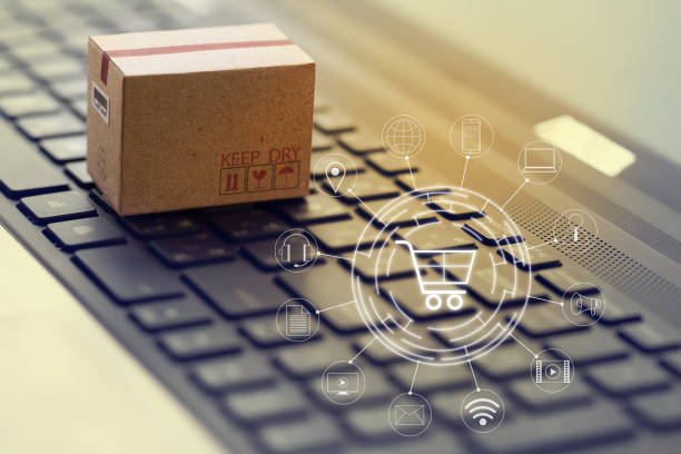 istock Shopping online, e-commerce concept: Cardboard boxes with icon customer network connection on keyboard. depicts of transportation that can be done easily using an online internet. 1287346160
