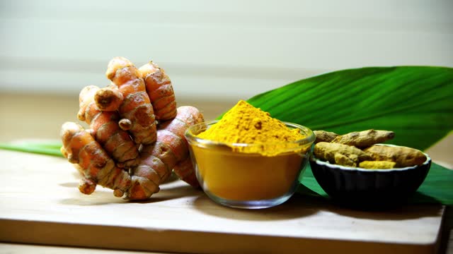 fresh turmeric with the leaf for culinary