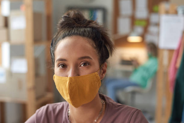 istock Woman in protective mask 1287350630