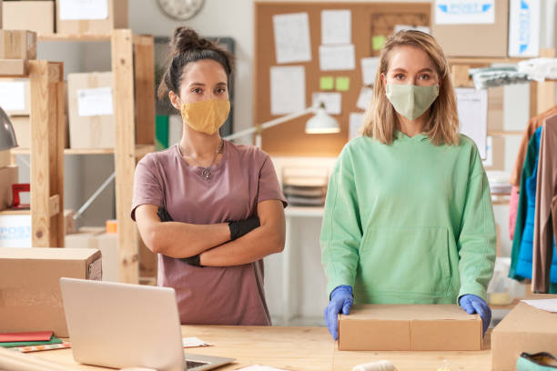 istock People in masks working in delivery service 1287351274
