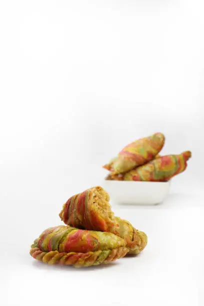 Gujiya or Ghughra is sweet indian deepfried snacks made during festival like Diwali and Holi.