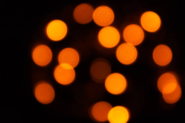 istock Defocused golden bokeh on black background. abstract background. Bokeh Christmas 1287353143