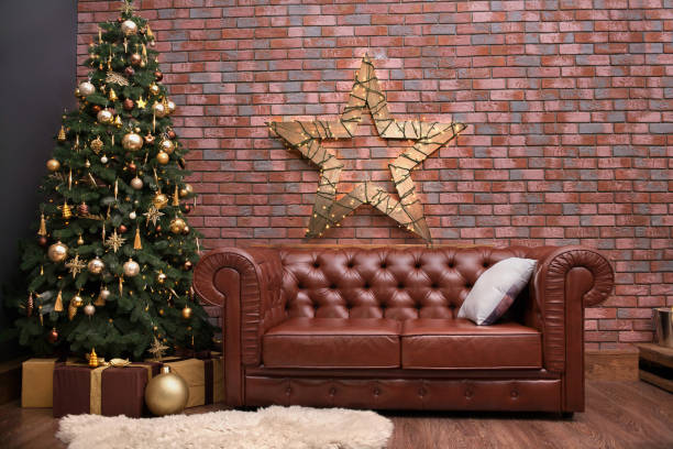 istock Beautiful christmas tree with decorations in the living room 1287358643