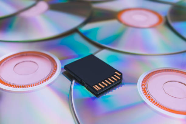istock Modern storage of information on a flash drive compared to old disks 1287360456