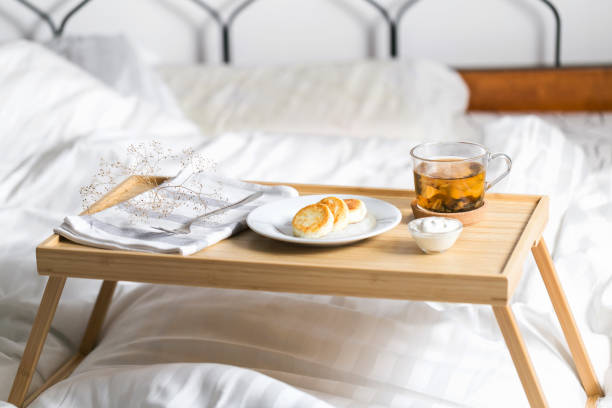 istock Cottage cheese pancakes on the bed tray table 1287361292