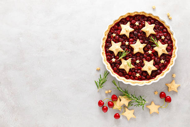 istock Homemade cherry pie, tart with star shaped cookies 1287366336