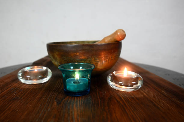 Wooden table. Lighted candles making a special atmosphere