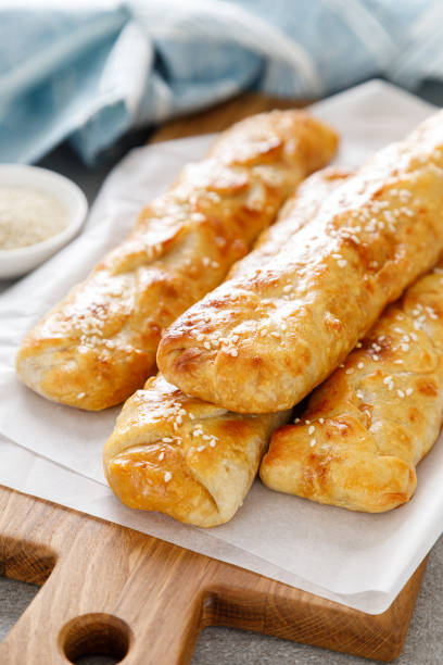 istock Freshly baked homemade savory puff pastries patties, rollini 1287367849