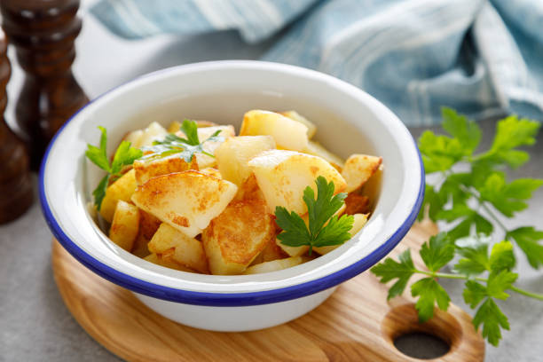 istock Baked potato with fresh parsley 1287368125
