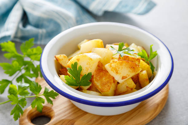 istock Baked potato with fresh parsley 1287368137
