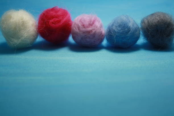 istock Balls of colored wool for making beads. 1287373362