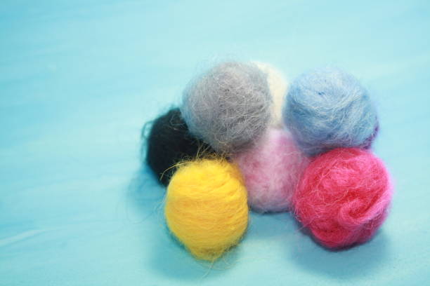 istock Balls of colored wool for making beads. 1287373366