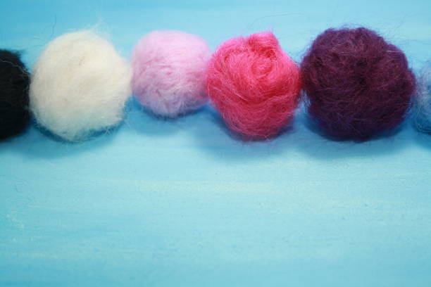 istock Balls of colored wool for making beads. 1287373377