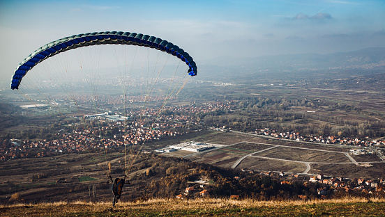 Man starts paragliding