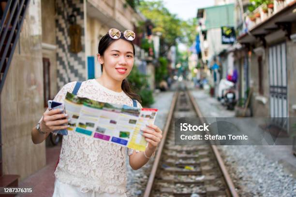 Female Tourist In The Hanoi Train Street Vietnam Stock Photo - Download Image Now - Adult, Alley, Architecture