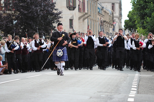 Quimper, France - July 24 2022: Musicians of the Bagad Penhars during the Cornouaille festival.