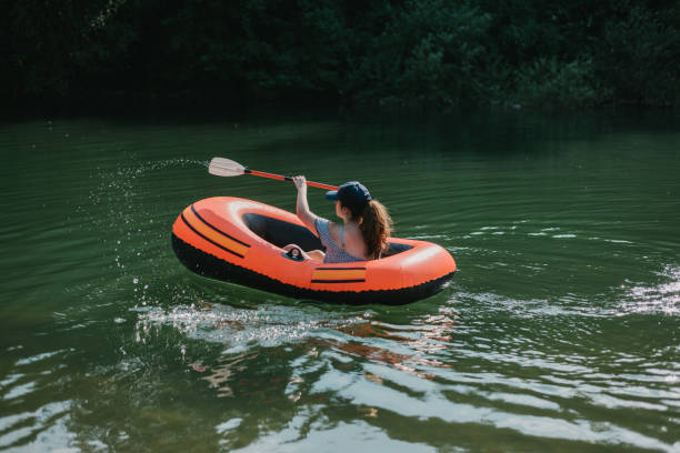 istock Young woman rowing 1287381142