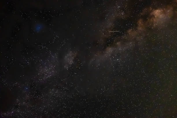 istock Black milky way stars night on dark background. Night background. Abstract space background. Dark background. Starry sky. Night scene. 1287382725