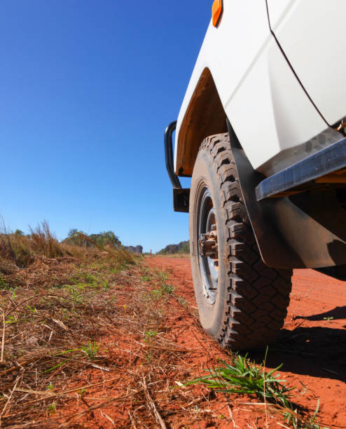 Four wheel drive wheel on red dirt road
