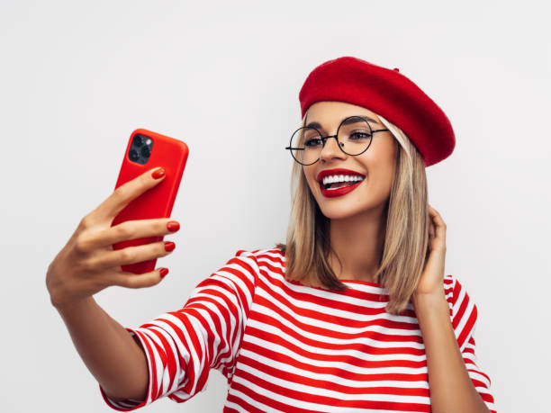 istock Beautiful smiling woman taking selfie 1287390804