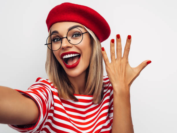 istock Beautiful smiling woman taking selfie 1287390851